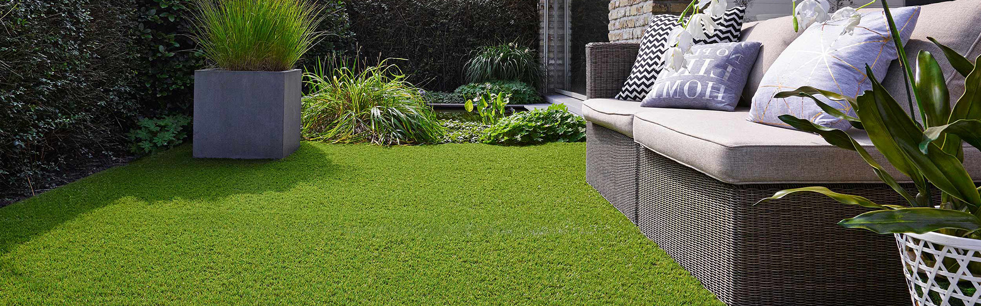 Beautiful garden with artificial grass lawn